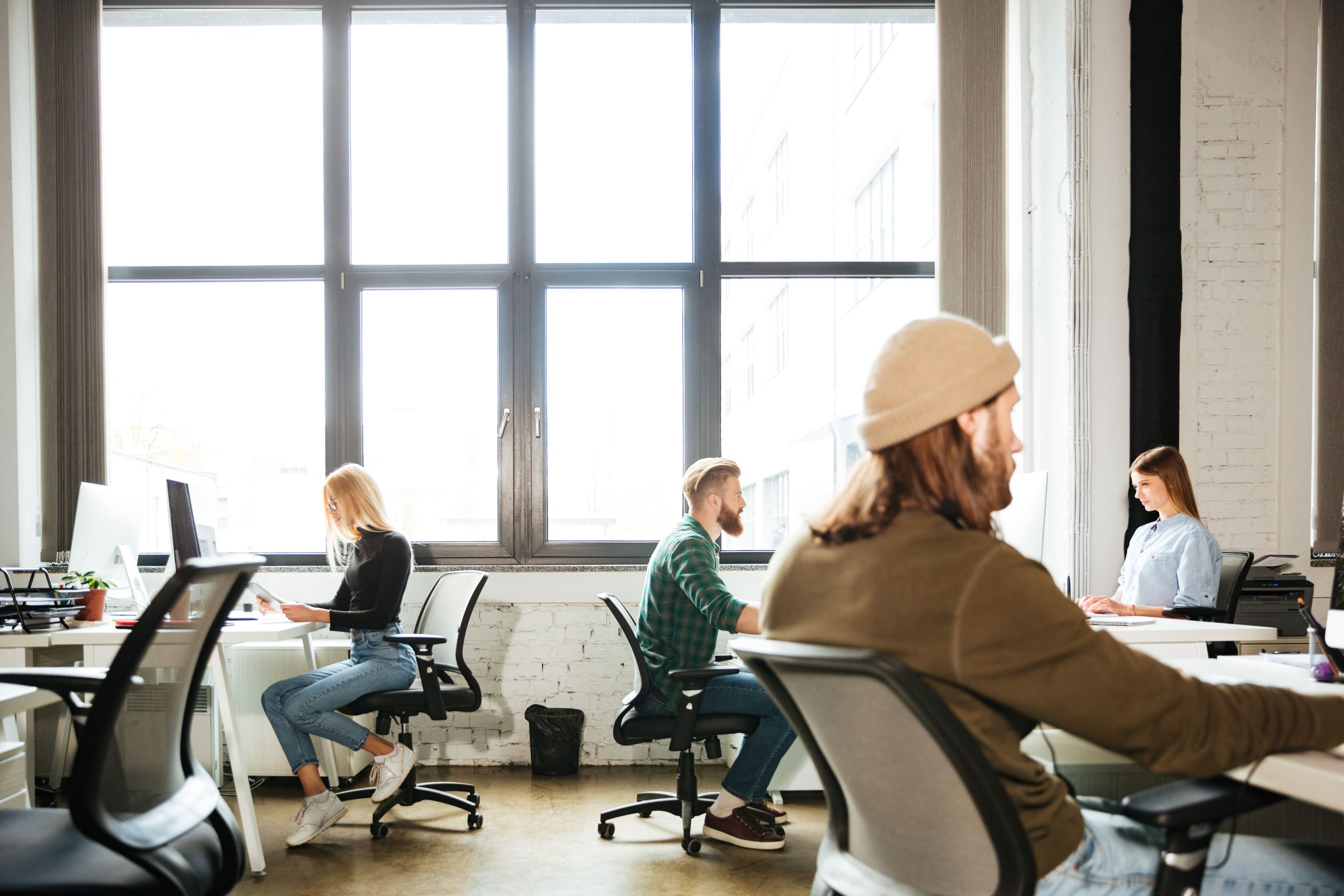 VISION adjustable executive chair in collaborative workspace